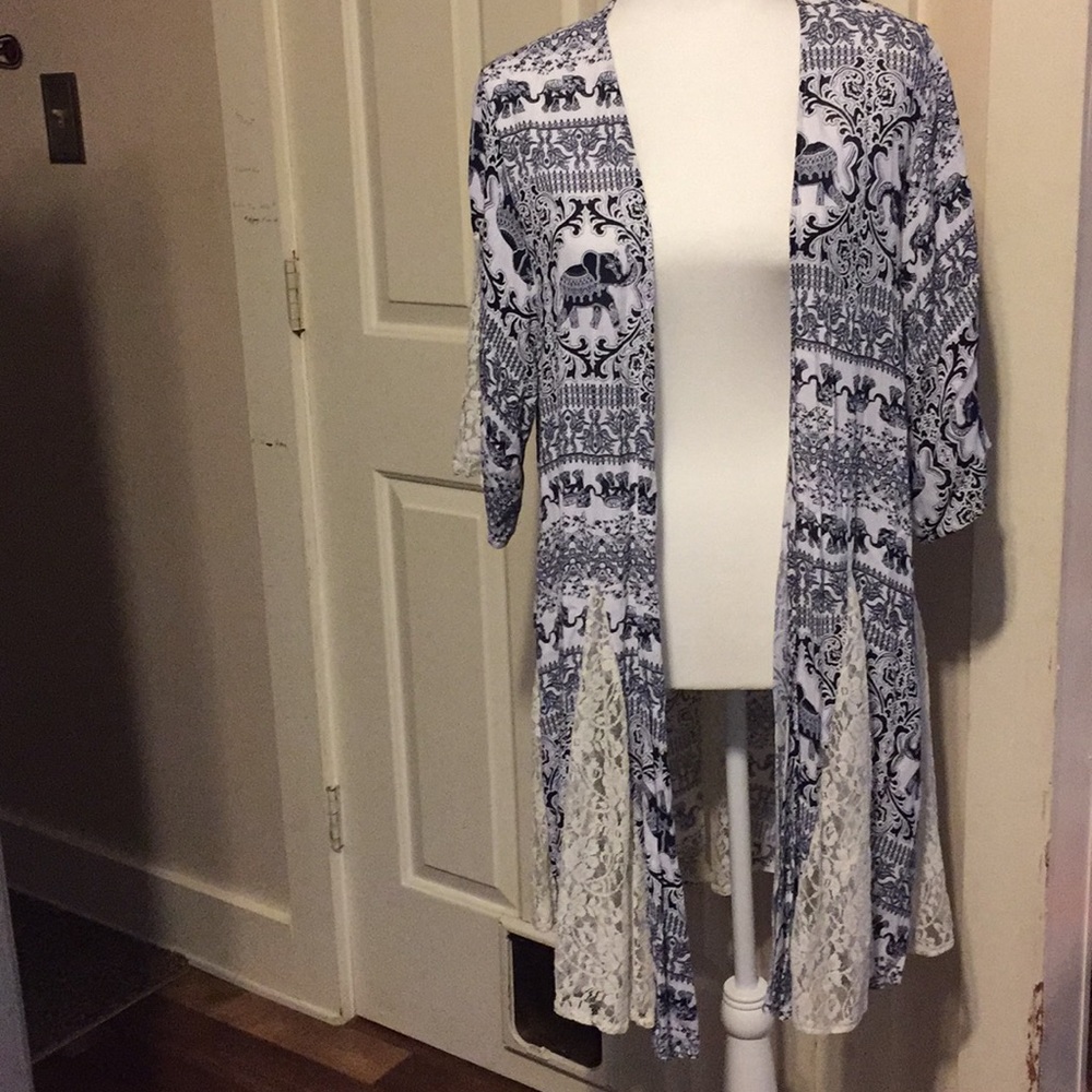 Justify 100% rayon with lace accents